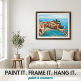 Finished paint by numbers kit displayed on wall — completed canvas artwork in a home setting