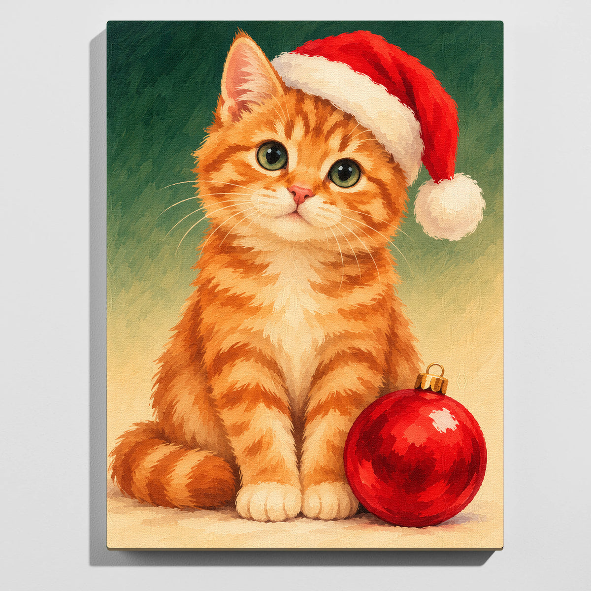 Christmas cat paint by numbers kit: finished painting of a ginger kitten in a Santa hat sitting beside a red Christmas bauble